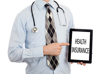 Image showing Doctor holding tablet - Health insurance