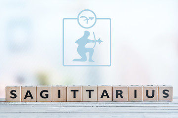 Image showing Sagittarius star sign on a table