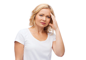 Image showing unhappy woman suffering from headache