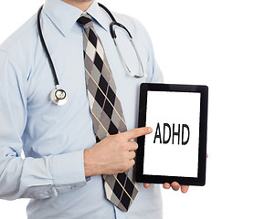 Image showing Doctor holding tablet - ADHD