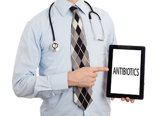 Image showing Doctor holding tablet - Antibiotics