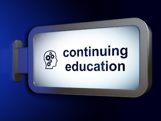 Image showing Learning concept: Continuing Education and Head With Gears on billboard background