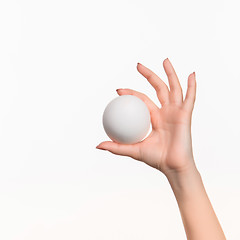 Image showing The female hand holding white blank styrofoam ball 