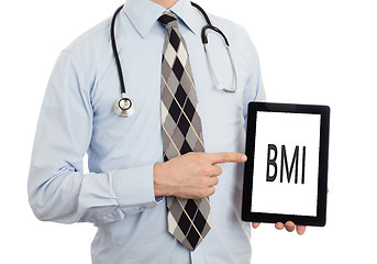 Image showing Doctor holding tablet - BMI