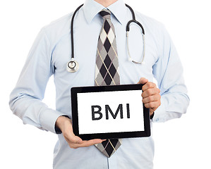 Image showing Doctor holding tablet - BMI