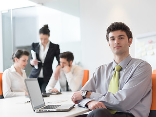 Image showing group of young business people  on meeting at modern startup off