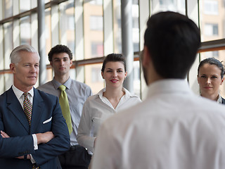 Image showing business leader making presentation and brainstorming