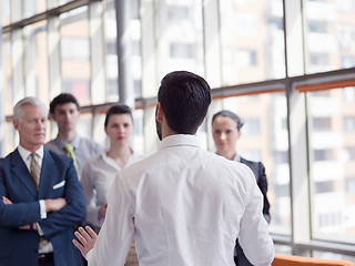 Image showing business leader making presentation and brainstorming