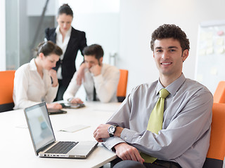 Image showing group of young business people  on meeting at modern startup off