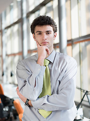 Image showing portrait of young business man at modern office