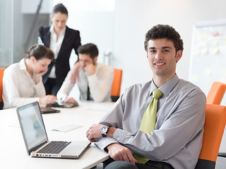 Image showing group of young business people  on meeting at modern startup off