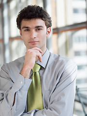 Image showing portrait of young business man at modern office