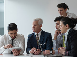 Image showing business people group on meeting at modern startup office