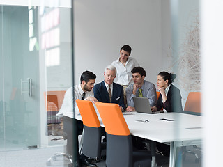 Image showing business people group on meeting at modern startup office