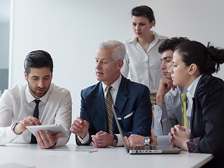 Image showing business people group on meeting at modern startup office