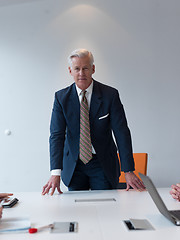 Image showing confident and handsome  senior business man