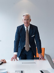 Image showing confident and handsome  senior business man