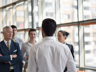 Image showing business leader making presentation and brainstorming