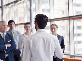 Image showing business leader making presentation and brainstorming