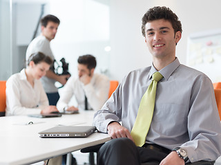 Image showing group of young business people  on meeting at modern startup off