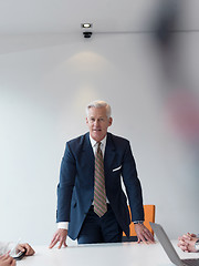 Image showing confident and handsome  senior business man