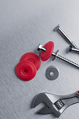 Image showing Spanner tool and screws