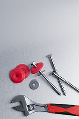 Image showing Spanner tool and screws