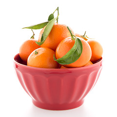 Image showing Tangerines on ceramic red bowl 