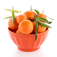 Image showing Tangerines on ceramic orange bowl 