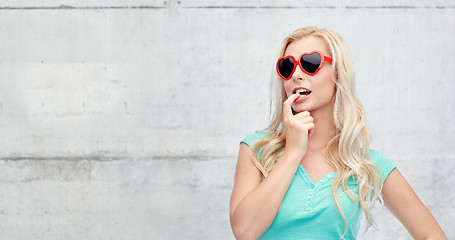 Image showing happy young blonde woman or teenager in sunglasses