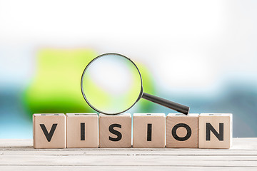 Image showing Vision word and a magnifying glass