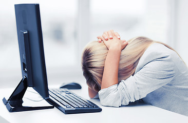 Image showing stressed woman with computer