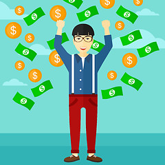 Image showing Happy man with  flying money. 