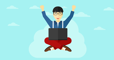 Image showing Man sitting on cloud with laptop.