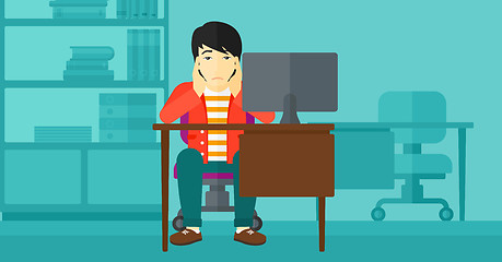 Image showing Tired employee sitting in office.