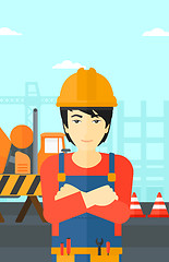 Image showing Friendly builder with arms crossed.