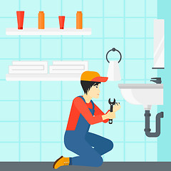 Image showing Man repairing sink.