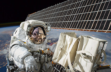 Image showing International Space Station and astronaut.