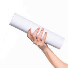 Image showing The cylinder female hands on white background