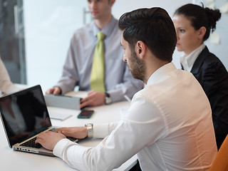 Image showing group of young business people  on meeting at modern startup off