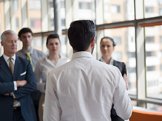 Image showing business leader making presentation and brainstorming