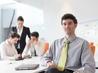 Image showing group of young business people  on meeting at modern startup off