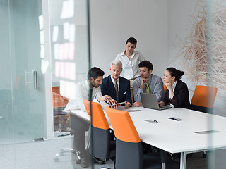 Image showing business people group on meeting at modern startup office