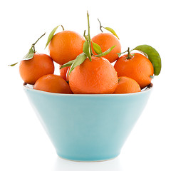 Image showing Tangerines on ceramic blue bowl 