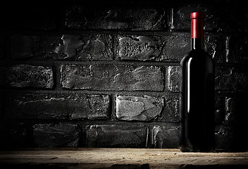 Image showing Brick wall and cabernet