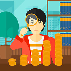 Image showing Man with magnifier and golden coins. 