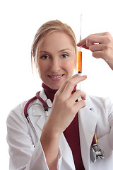 Image showing Female doctor with medical syringe