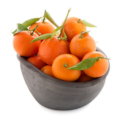 Image showing Tangerines on clay bowl 