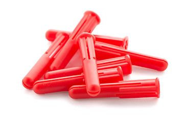 Image showing Red plastic dowels