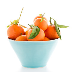 Image showing Tangerines on ceramic blue bowl 